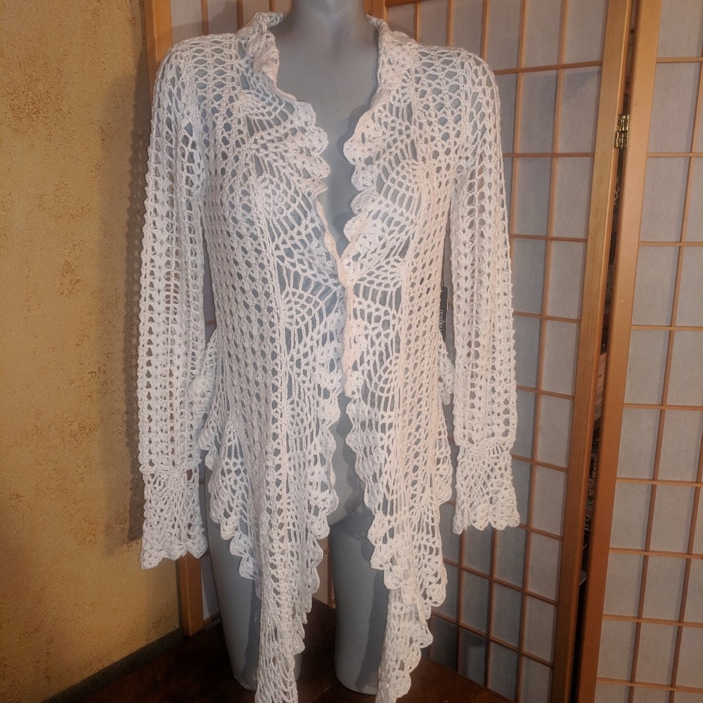 Vertigo low/ hi sweater, NEW with tags, small.